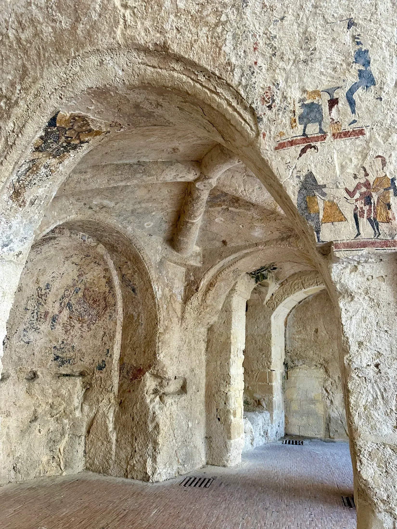 A frescoed rock-cut church visited on a shore excursion from Explora I