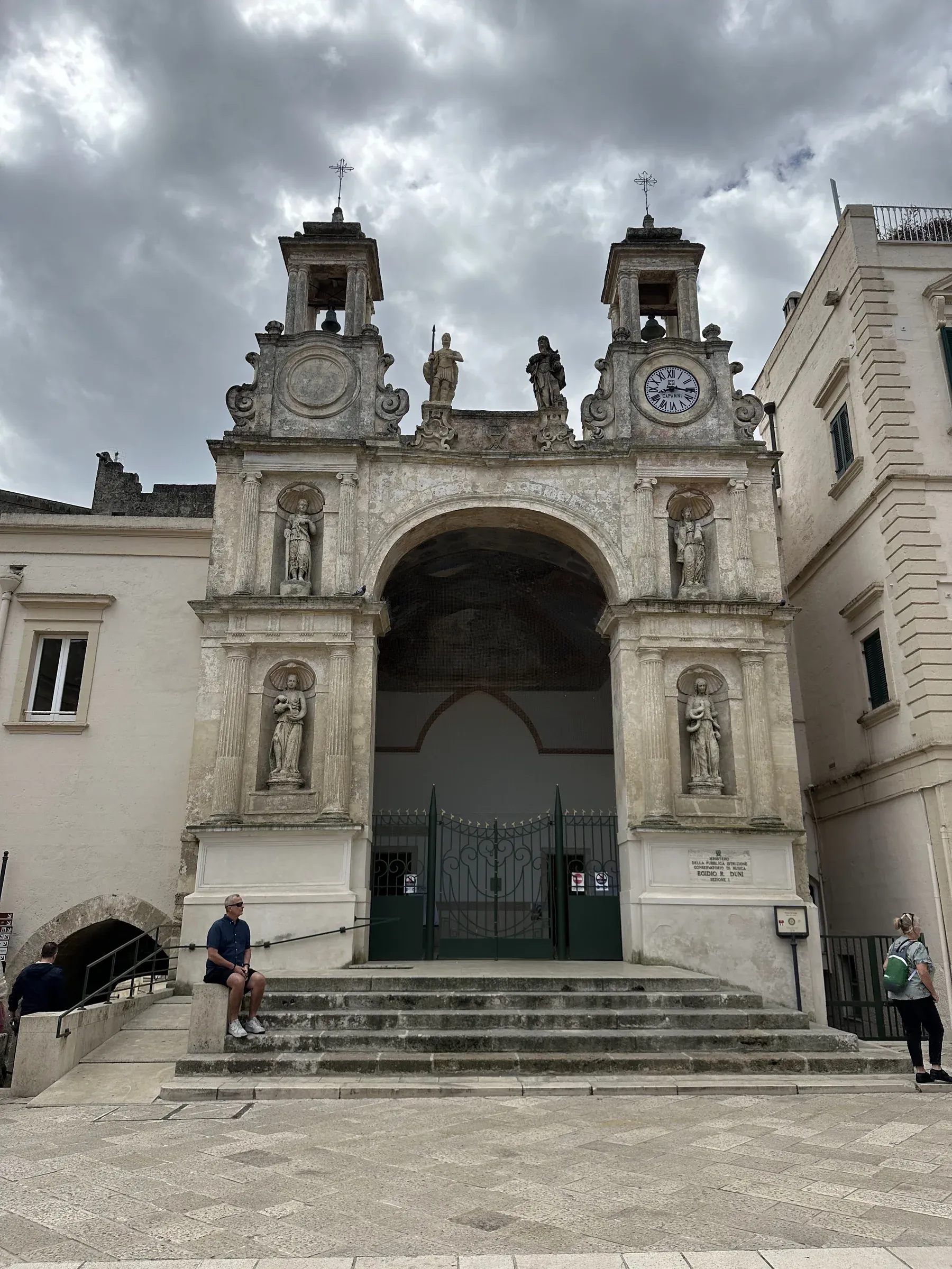A baroque cathedral facade on a Mediterranean town square