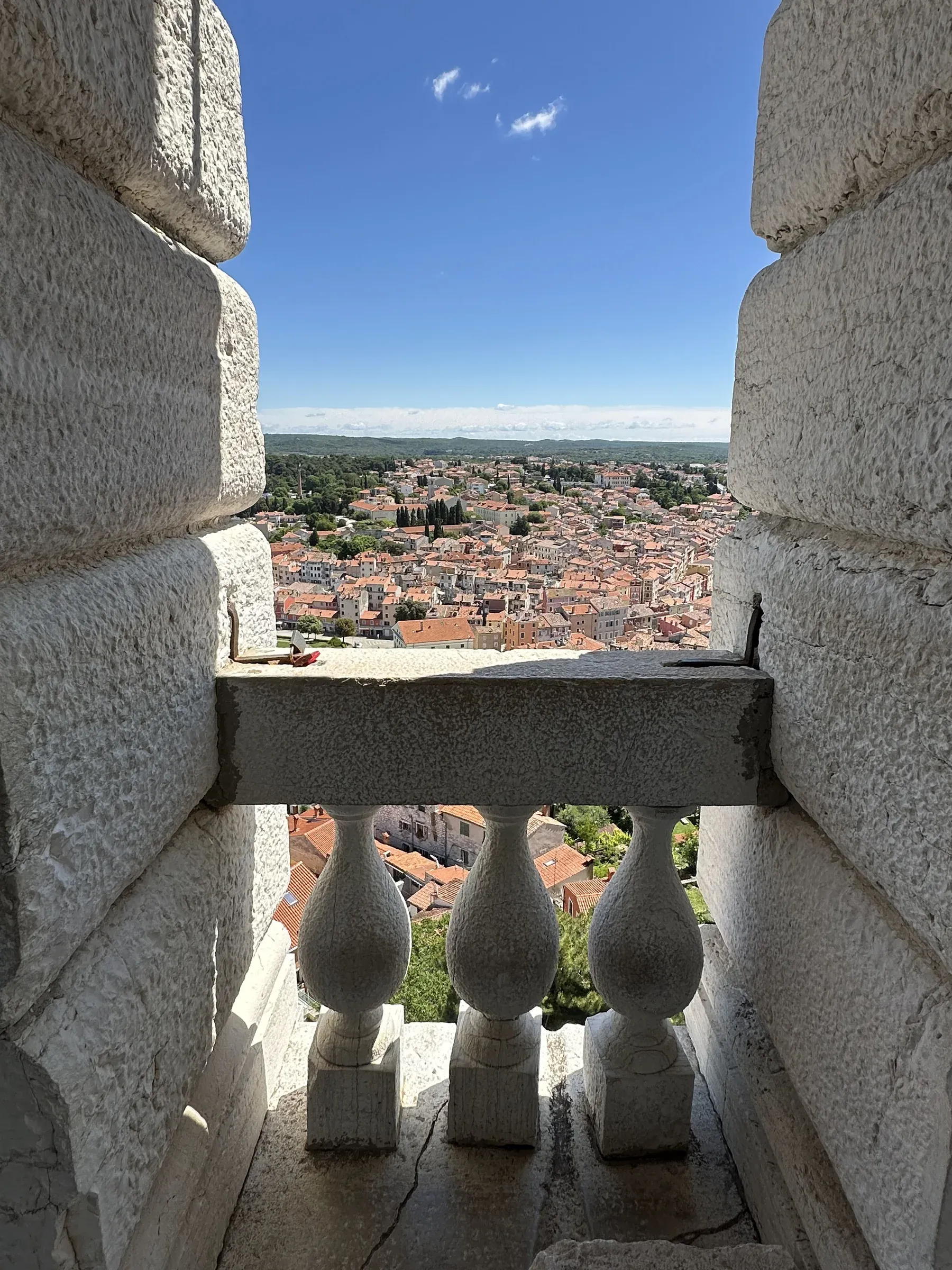 A stone overlook above the harbor and old town of Rovinj, Croatia