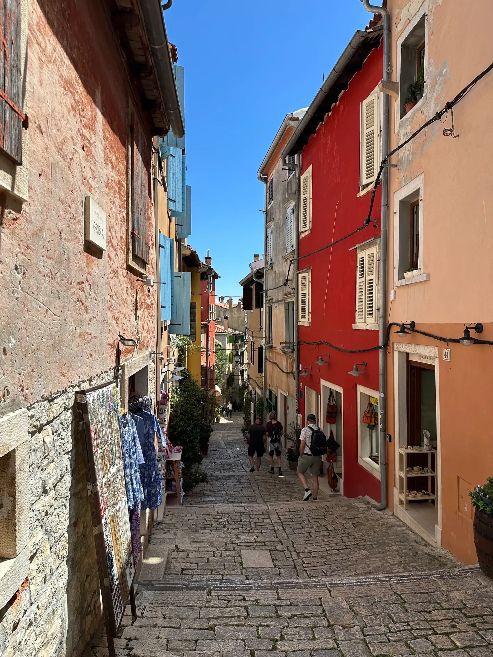 Colorful waterfront buildings in a Mediterranean port town